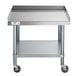 A Regency stainless steel equipment stand with wheels.