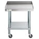 A Regency stainless steel equipment stand with an undershelf and casters.