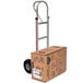 A Magliner hand truck with a box on it.