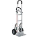 A silver and red Magliner hand truck with Y-cable brake, foam wheels, and stairclimbers.