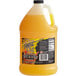 A jug of Finest Call sweet and sour mix concentrate with a yellow liquid and label.