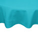 A teal Intedge round poly/cotton blend table cover on a table.