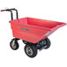 A red Magliner motorized hopper cart with black wheels and dual handle bars.