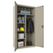 A Hirsh Industries putty steel wardrobe cabinet.