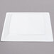 A white rectangular WNA Comet Milan plastic plate with a white square border.
