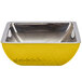 A yellow Bon Chef square bowl with silver rim.