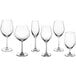A group of Acopa Elevation clear wine glasses with stems.