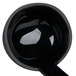 A black ladle with a handle.