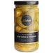 A jar of Belosa Blue Cheese & Habanero Pepper Stuffed Queen Olives on a table with a white label.