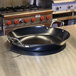 An American Metalcraft wrought iron paella pan on a counter.
