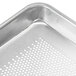 An Advance Tabco aluminum sheet pan with a wire rim and perforated bottom.