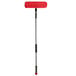 A Lavex red and silver spray mop kit with a long silver and black handle.
