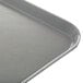 A close up of a gray Dinex fiberglass tray.