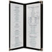 A menu board with a black frame and white pages holding a menu with blue text.