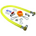 A yellow T&S Safe-T-Link gas appliance connector hose with installation kit parts.