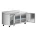 An Avantco stainless steel worktop refrigerator with two doors and shelves.