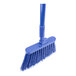 A blue Carlisle Sparta Duo-Sweep broom with a handle.