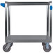 A stainless steel Carlisle utility cart with metal wheels and blue handles.