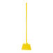 A yellow broom with a yellow handle.