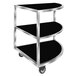 A black and silver metal Eastern Tabletop corner extension serving cart with three reversible shelves.
