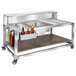 A stainless steel Eastern Tabletop bar cart with bottles on it.
