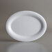 An American Metalcraft Jane Collection white oval melamine platter on a gray background.