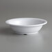 An American Metalcraft white melamine bowl on a gray surface.