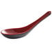 A red and black Thunder Group wonton soup spoon with a handle.