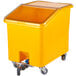 A yellow Cambro container with a clear lid on a white background.