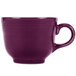 A close-up of a purple Fiesta china cup with a handle.