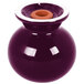 A purple round salt and pepper shaker set with a white rim.