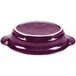 A purple oval china baker with a white rim.