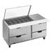A Beverage-Air stainless steel refrigerated sandwich prep table with clear lids on four drawers.