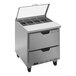 A stainless steel Beverage-Air refrigerated sandwich prep table with 2 drawers and clear lids.