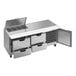 A stainless steel Beverage-Air sandwich prep table with drawers and clear lids.