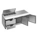 A stainless steel Beverage-Air sandwich prep table with open drawers on a counter.