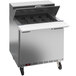 A Beverage-Air stainless steel refrigerated sandwich prep table on wheels.