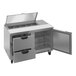 A stainless steel Beverage-Air refrigerated sandwich prep table with open drawers.