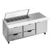 A Beverage-Air stainless steel refrigerated sandwich prep table with clear lids over drawers.