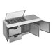 A silver stainless steel Beverage-Air sandwich prep table with open drawers and clear lids.