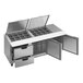 A Beverage-Air stainless steel refrigerated sandwich prep table with 2 drawers and a clear lid on a counter.