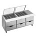 A Beverage-Air refrigerated mega top sandwich prep table with six drawers and clear lids.