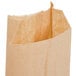 A Duro brown paper bag with torn edges.