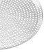 An American Metalcraft Mega Perforated Aluminum Pizza Pan with a metal surface and holes.