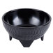 A black GET Viva Mexico melamine molcajete bowl with three legs.