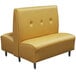 A yellow leather booth from American Tables & Seating with metal legs.