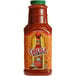 A 64 oz. bottle of Cholula Chili Garlic hot sauce.