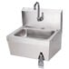 A stainless steel Advance Tabco hand sink with a knee operated valve.