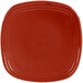 A red square Fiesta dinnerware salad plate with a white background.