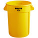 A close up of a yellow Rubbermaid Brute trash can.
